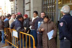 cola inmigrantes