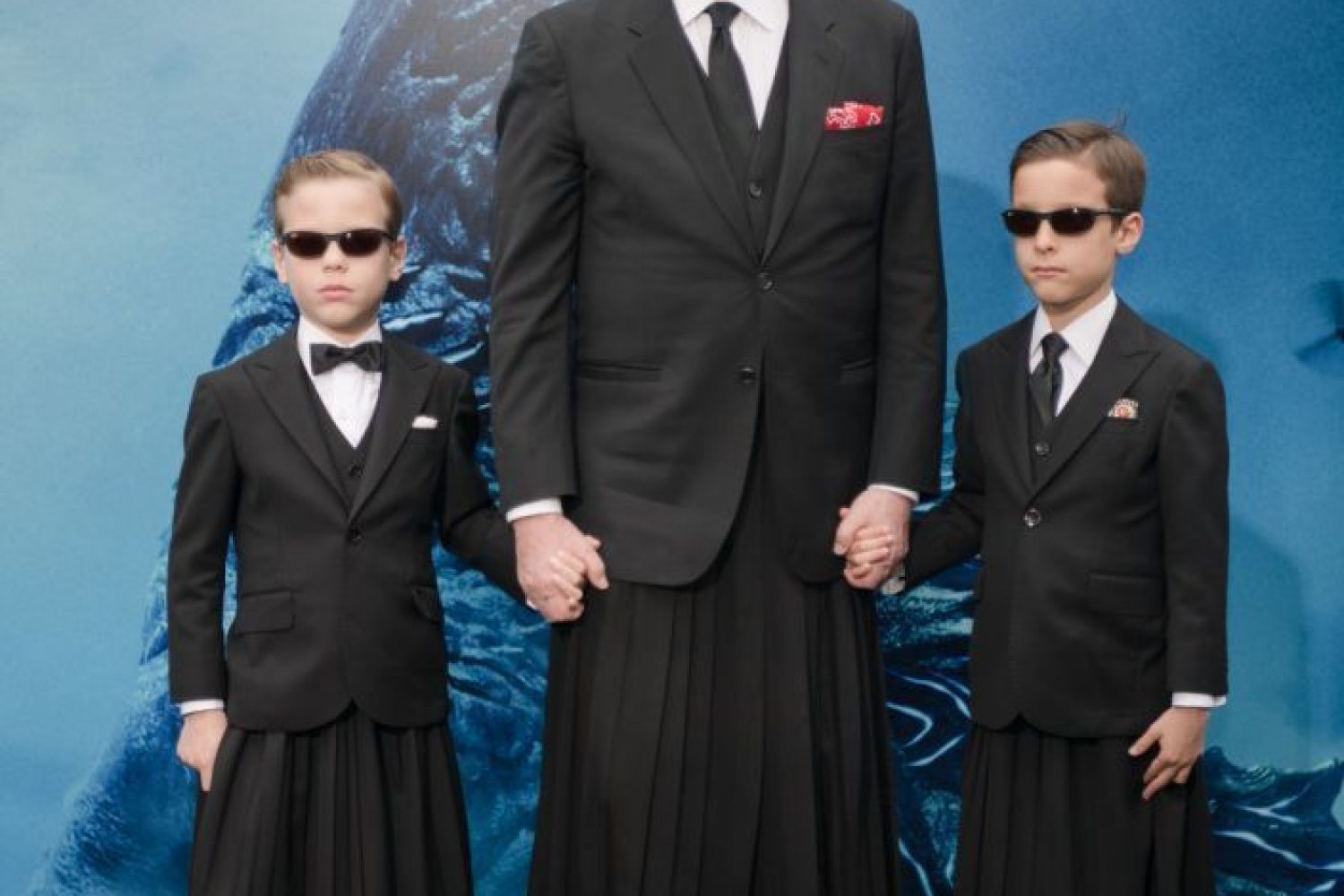 HOLLYWOOD, CALIFORNIA - MAY 18: Miguel Bose and sons Diego and Tadeo arrive at the premiere Of Warner Bros. Pictures And Legendary Pictures' "Godzilla: King Of The Monsters" at TCL Chinese Theatre on May 18, 2019 in Hollywood, California. (Photo by Morgan Lieberman/WireImage)