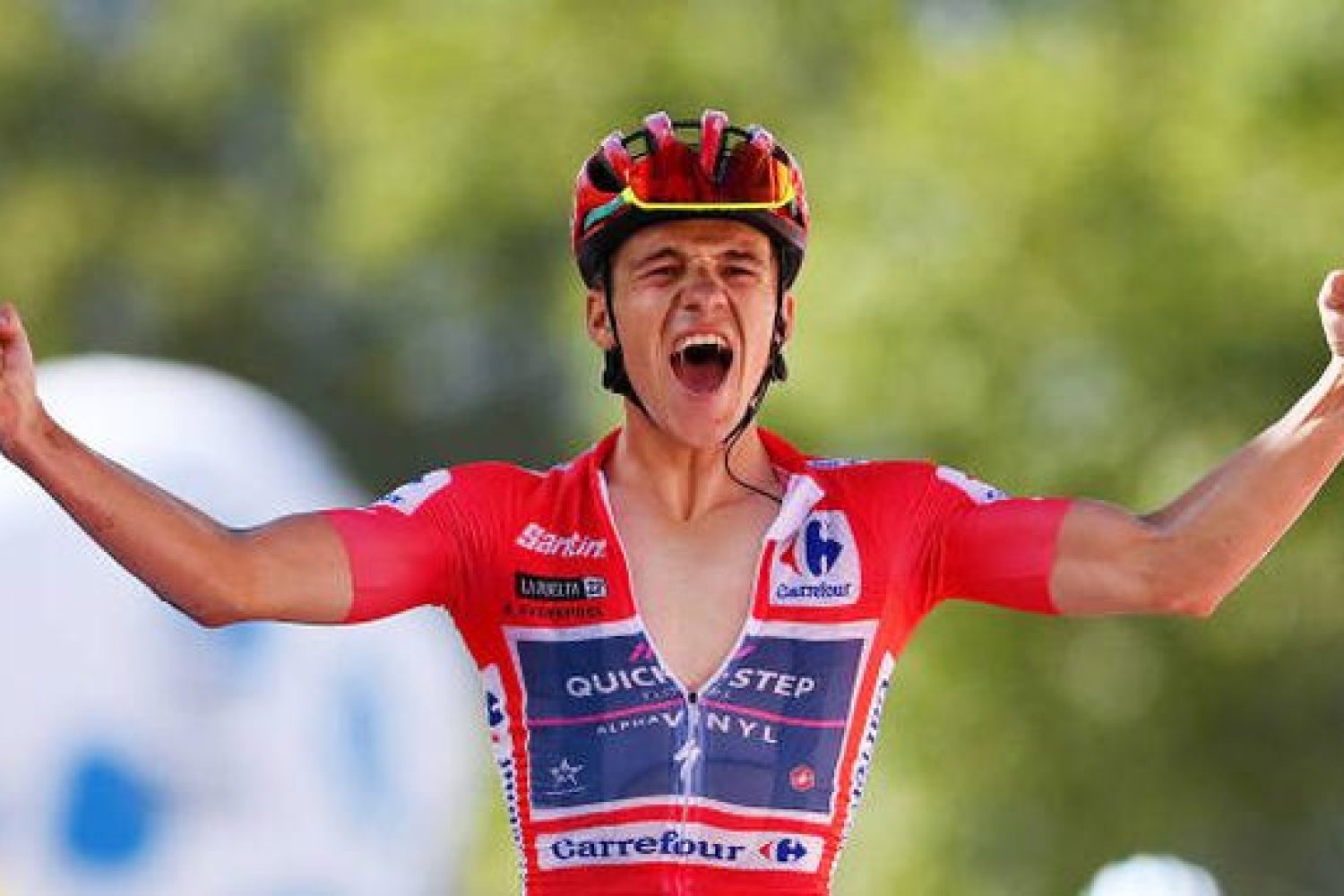 ALTO DEL PIORNAL, SPAIN - SEPTEMBER 08: Remco Evenepoel of Belgium and Team Quick-Step - Alpha Vinyl - Red Leader Jersey celebrates winning during the 77th Tour of Spain 2022, Stage 18 a 192km stage from Trujillo to Alto del Piornal 1163m / #LaVuelta22 / #WorldTour / on September 08, 2022 in Alto del Piornal, Caceres, Spain. (Photo by Justin Setterfield/Getty Images)