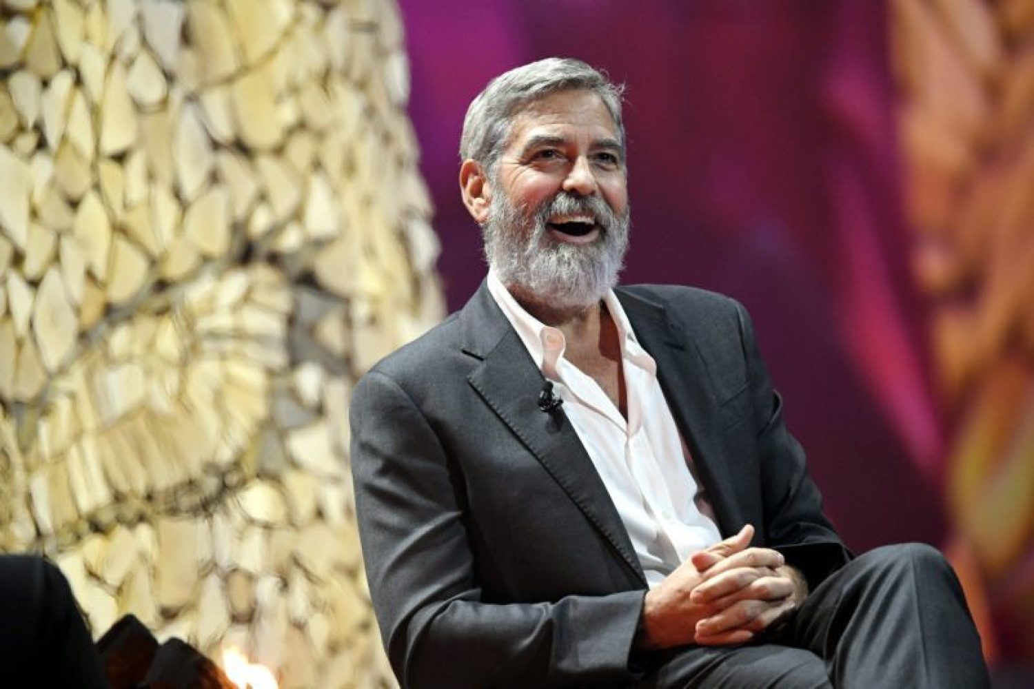 US actor and director George Clooney laughs during the Nordic Business Forum business seminar in Helsinki, Finland on October 10, 2019. (Photo by Heikki Saukkomaa / Lehtikuva / AFP) / Finland OUT (Photo by HEIKKI SAUKKOMAA/Lehtikuva/AFP via Getty Images)